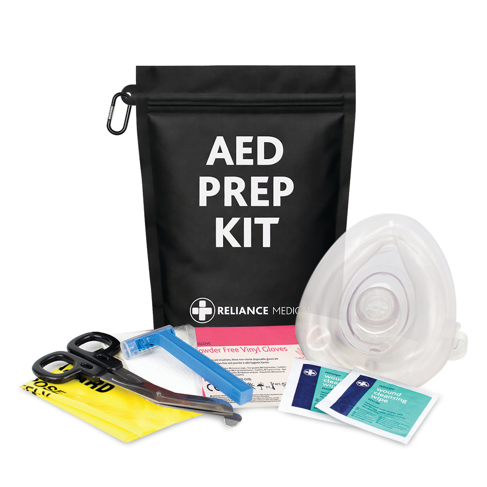 AED prep kit for use with defibrillator and CPR in emergency situations, including shears, razor, resuscitation shield and gloves