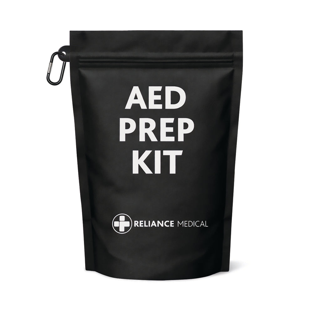AED prep kit for use with defibrillator and CPR in emergency situations, including shears, razor, resuscitation shield and gloves