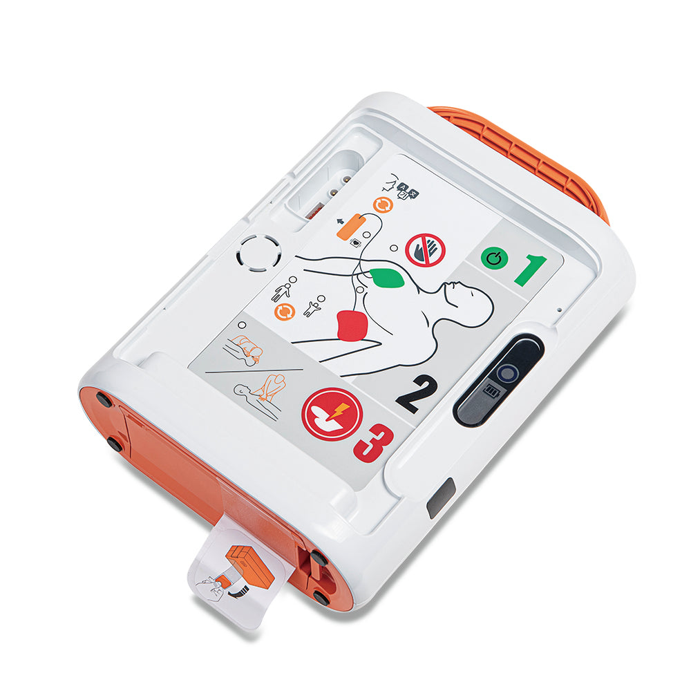 Mediana A16 Core HeartOn semi-automatic AED defibrillator unit with electrode pads and clear instructions, designed for emergency cardiac response and resuscitation.
